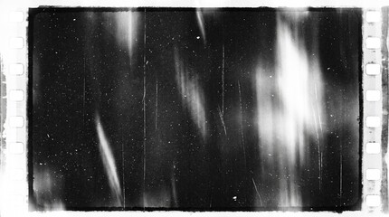 Obraz premium Old film texture with scratches, noise and light leaks. Realistic transparent overlay film texture in black-white, dust and grain. Distressed retro movie or photo negative effect of cinema nostalgia