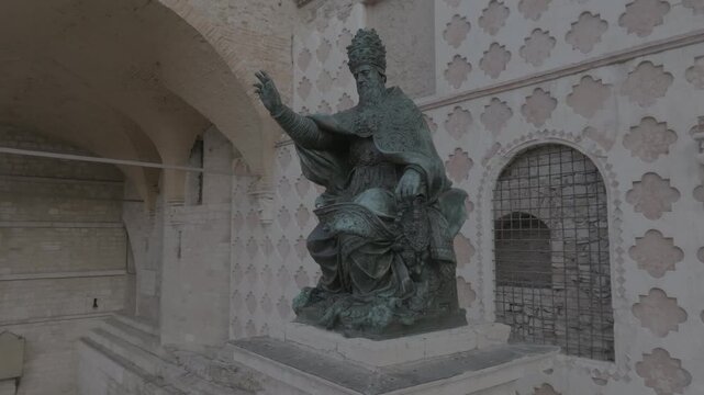 Aerial view of the bronze statue of Pope Julius III situated in front of the Cathedral of San Lorenzo in Perugia, Umbria, Italy.
