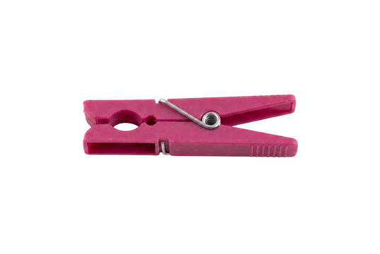 Pink plastic clothespin isolated on a white background