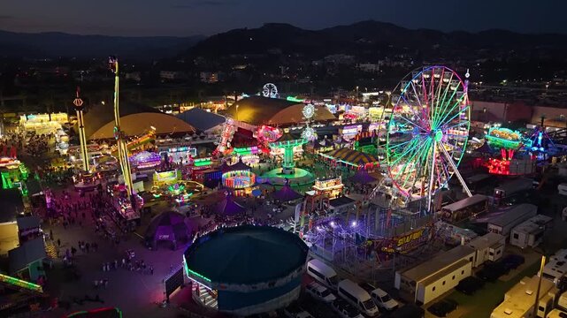 CALIFORNIA - 9.2.2026 - Remarkable aerial footage moving over the Ventura County Fair's carnival rides at night.