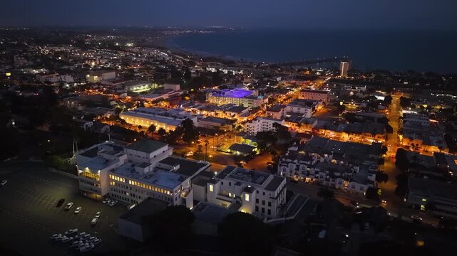CALIFORNIA - 9.2.2026 - Stunning aerial footage moving over downtown Ventura, California at night, headed towards the water.