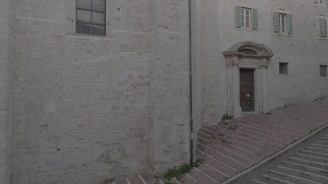 Aerial view of stone steps leading up to a historic building in the old town of Perugia, Umbria, Italy.