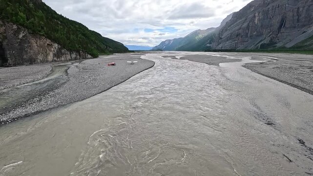 ALASKA - 9.3.2026 - Great aerial footage of bush pilots taking off from a glacier outwash river in Alaska.