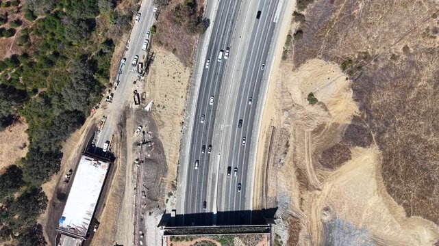 CALIFORNIA - 9.22.2026 - Wonderful aerial footage moving down California's Highway 101 until it reaches the Wallis Annenberg Wildlife Crossing, still under construction.