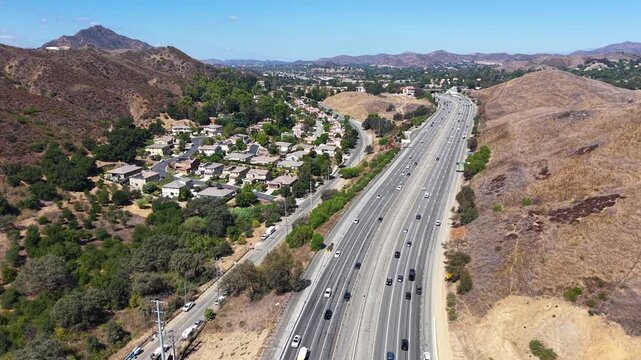 CALIFORNIA - 9.22.2026 - Excellent aerial tilt down California's Highway 101, revealing the Wallis Annenberg Wildlife Crossing which is still under construction.