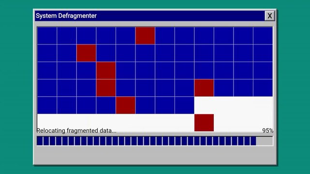 Vintage computer system defragmenter window on desktop interface graphic user showing a defragmentation progress bar and colored grid tiles software grid blue retro technology
