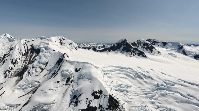ALASKA - 9.3.2026 - Gorgeous aerial footage approaching snowy mountains in Alaska's Wrangell�St. Elias National Park and Preserve.