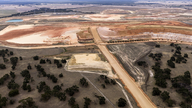 Aerial view of industrial mining patterns, sand, and salt deposits across the landscape in Kalbarri, Western Australia, Australia.