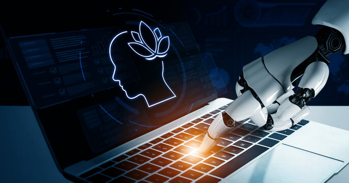 A futuristic robot hand interacts with a laptop display, showcasing a human brain symbol and digital interface, representing the concept of artificial intelligence and technology integration. Nascent