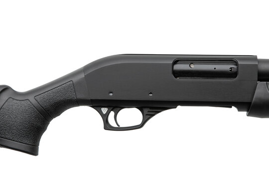 Black shotgun receiver with trigger close up isolated on white back