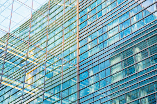 New modern glass building, blue toned image