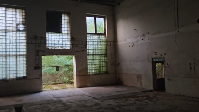 Abandoned old mine hall with empty industrial interior during urbex exploration