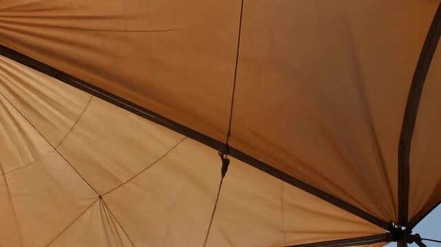 Desert tent flap moving in hot wind