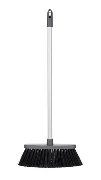 Plastic floor broom with a long metallic handle and durable black bristles designed for household cleaning tasks shown&nbsp;