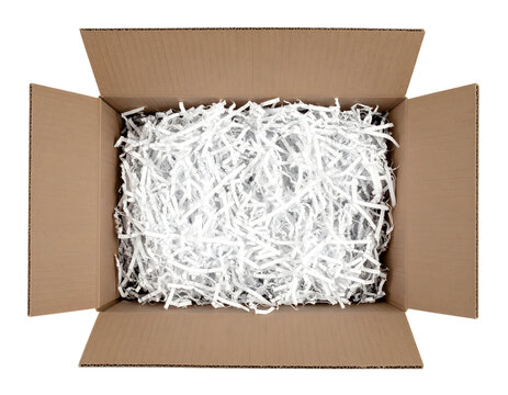 Cardboard box containing shredded white paper packing material for shipping and protecting fragile goods&nbsp;