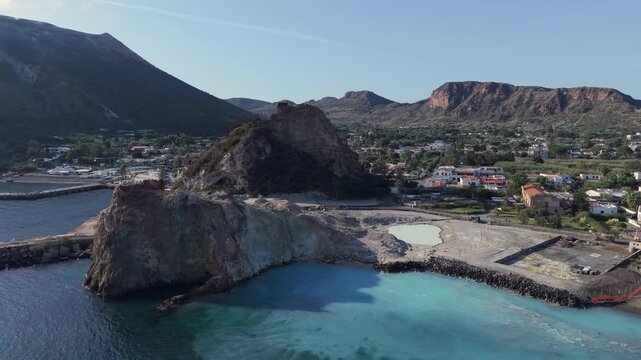 Aerial view of Vulcano island featuring the famous mud baths and geothermal landscape along the coastline Lipari, Sicily, Italy.