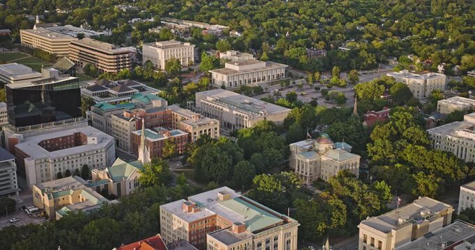 Raleigh North Carolina Aerial v22 birds eye view flyover downtown area, capturing the State Capitol Building amidst the verdant urban landscape - Shot with 8k Camera - Sept 30th 2023