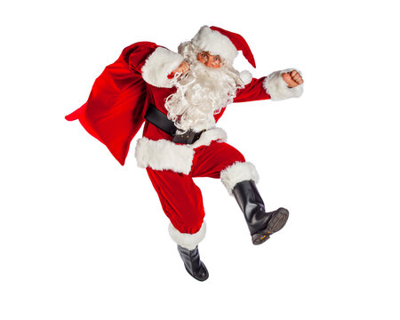 Santa Claus Jumping and Running with Gift Bag