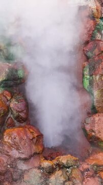 Umi Jigoku, (Sea hell), Kannawa district, Beppu City, Beppu Jigoku, Japan, steaming hot spring pond at Hells of Beppu tour, Oita Prefecture, Kyushu Island, vivid mineral colored geothermal water