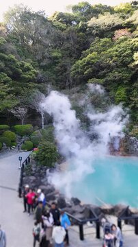 Umi Jigoku, (Sea hell), Kannawa district, Beppu City, Beppu Jigoku, Japan, steaming hot spring pond at Hells of Beppu tour, Oita Prefecture, Kyushu Island, vivid mineral colored geothermal water