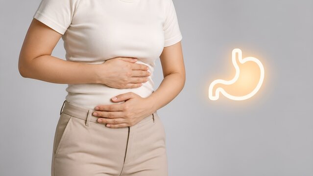 Woman feeling pain in bladder or urinary area holding hands on lower stomach with icon glowing
