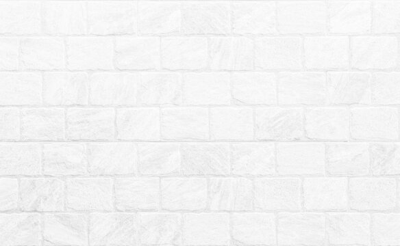 Kitchen wallpaper concept: Close up modern white brick tiles wall texture background, White brick wall texture background for stone tile block in grey light color wallpaper modern interior.