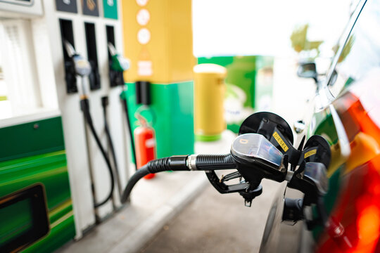 Car refilling diesel fuel at a modern petrol station