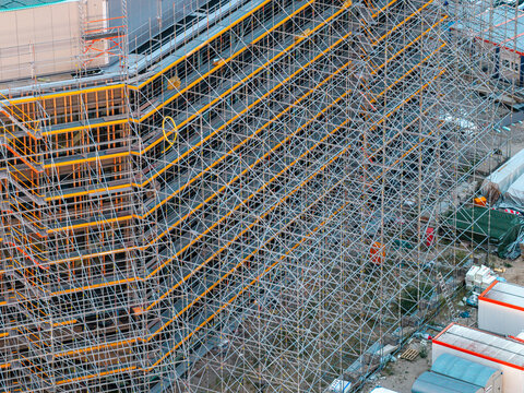 Aerial view of Helmholtz-Zentrum Berlin fur Materialien und Energie Science Campus with extensive metal scaffolding surrounding a building under construction in Berlin, Berlin, Germany.