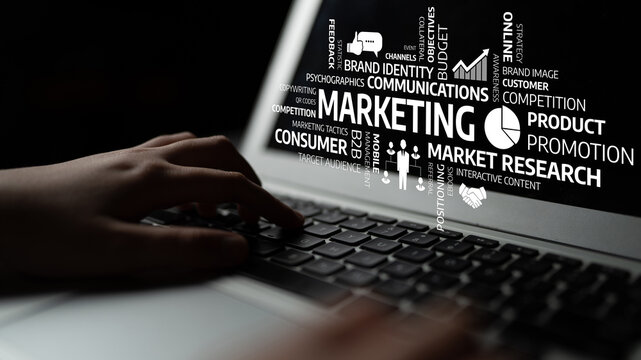 This image features a close-up shot of hands typing on a laptop keyboard, surrounded by marketing concepts, highlighting the influence of digital strategies on consumer behavior. Tessel