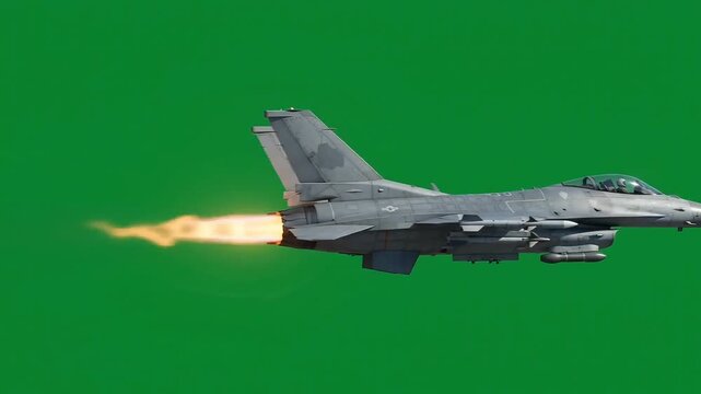Fighter jet flying fast with blazing afterburner in motion video footage against green screen background