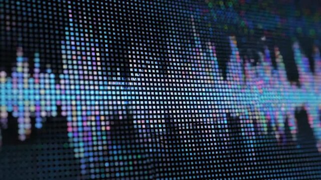 The screen displays audio waveform images and dynamic audio spectrum animation