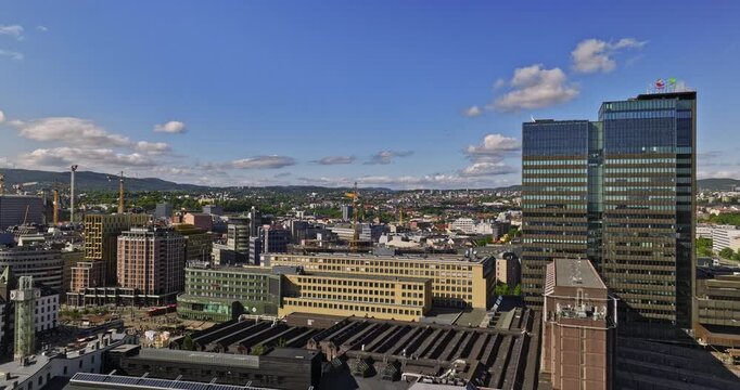 Oslo Norway Aerial v22 low level flyover waterfront opera house, public library capturing downtown cityscape across Gamle, Sentrum neighborhoods - Shot with Mavic 3 Cine - June 2022