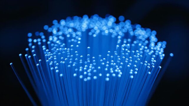 Close-up of blue optical fiber, dynamic luminescence of blue optical fiber bundle