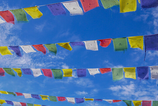Copenhagen, Denmark, 08.06.2026: view of Tibetan prayer flags in Freetown Christiania, an autonomous commune established in the borough of Christianshavn.