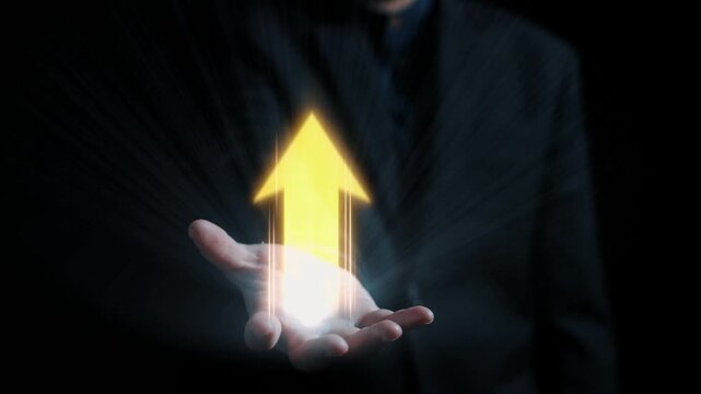 A stylish businessman showcases a glowing arrow representing financial growth above digital charts, signifying success and innovation in investment strategies. Qubit
