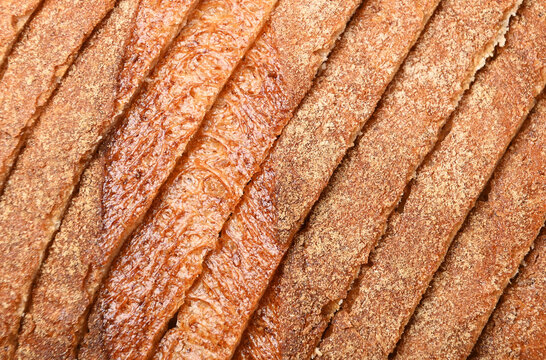 Appetizing textured background from sliced bread