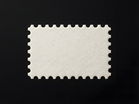 Blank postage stamp on black background isolated studio shot for mail and correspondence concepts