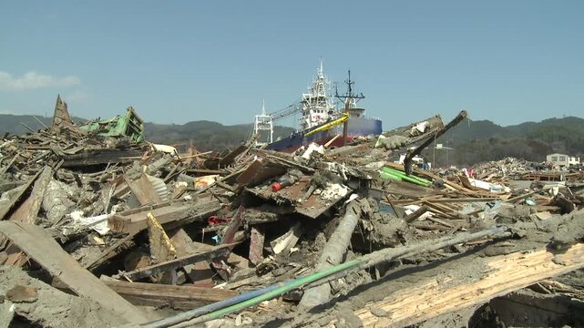 Wrecked Ship Surrounded By Debris In Aftermath Of Tsunami In Japan