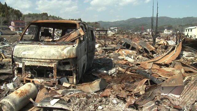 Burnt Out And Destroyed Vehicles In Aftermath Of Tsunami In Japan
