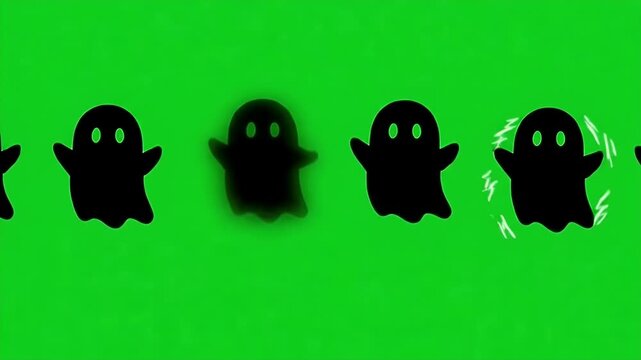 Black Ghost Silhouettes on Green Screen Background - A row of black, two-dimensional ghost silhouettes is displayed against a vibrant green screen background.