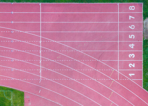 Aerial view of the Sports and Recreation Center running track with numbered lanes in Starogard Gdanski, Pomeranian Voivodeship, Poland.