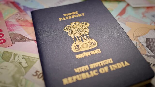 Indian Passport With International Banknotes