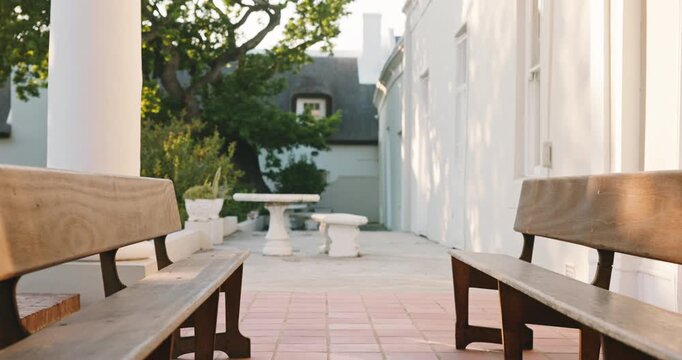 College, vacant or campus with outdoor bench, tertiary institution or porch in learning environment. Education infrastructure, empty building or chair, architecture or academic faculty in university