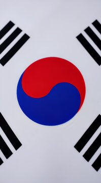 Official national flag of South Korea featuring Taegeuk symbol and trigrams on white background.