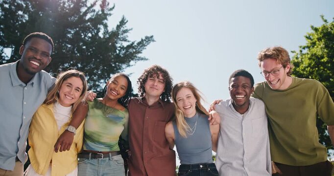 College students, face and hug with friends, outdoor and group with smile on break or relax together. Happy people, portrait and embrace on university campus, low angle and laughing with scholarship