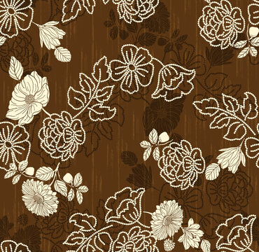 Seamless ethnic floral pattern featuring cream dotted beadwork flowers and line-drawn blooms over a warm chocolate brown background with subtle shadow overlays.