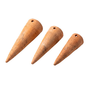 Three wooden cone-shaped objects on plain surface isolated on transparent background