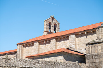 Ferreira de Panton romanesque bell tower with blue sky The Concept of religious heritage © VicVaz