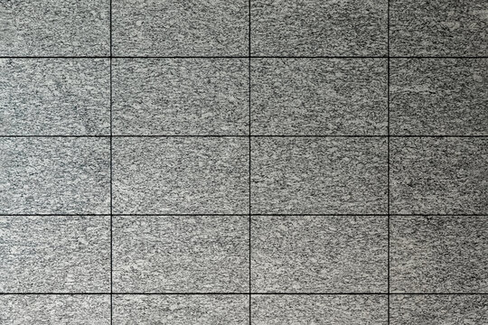 御影石のタイルが貼られた壁面の整然とした石テクスチャー,
