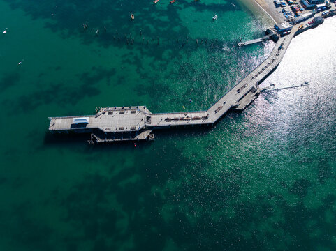 High angle aerial shot looking down on Swanage Pier, Dorset, UK